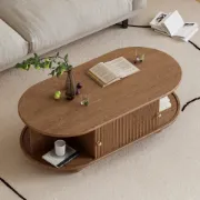 صورة طاولة قهوة توندو بيضاوية – خشب طبيعي مع تخزين وأرجل دائرية